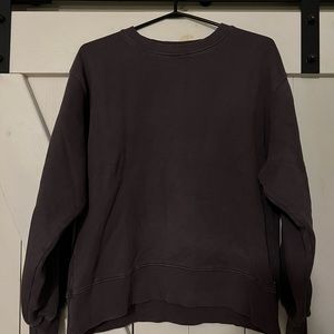 TNA purple crewneck.